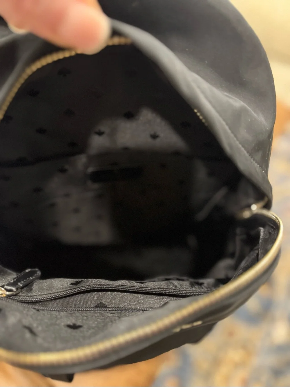 kate spade black nylon medium backpack with gold-tone logo